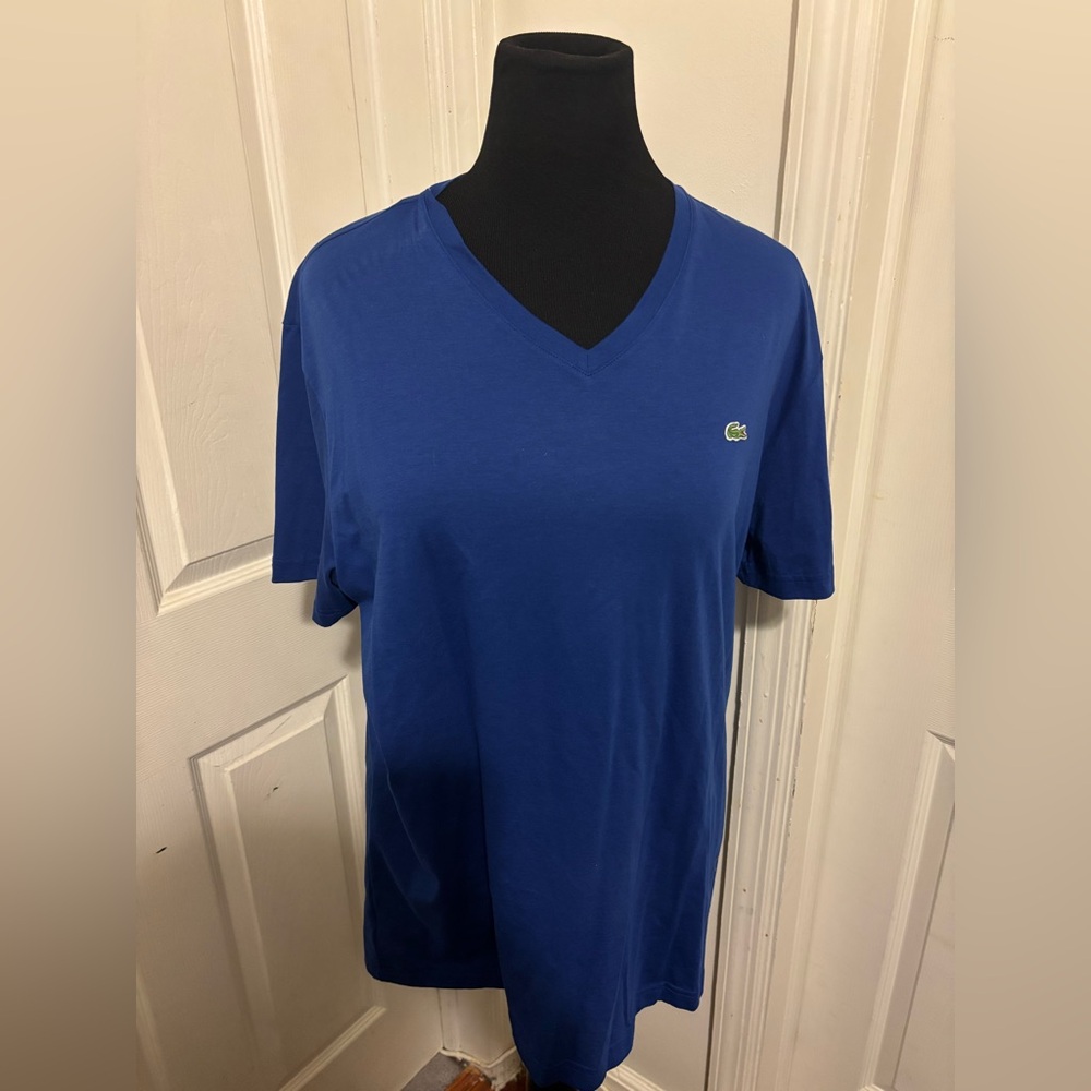 Lacoste blue v neck T-shirt.